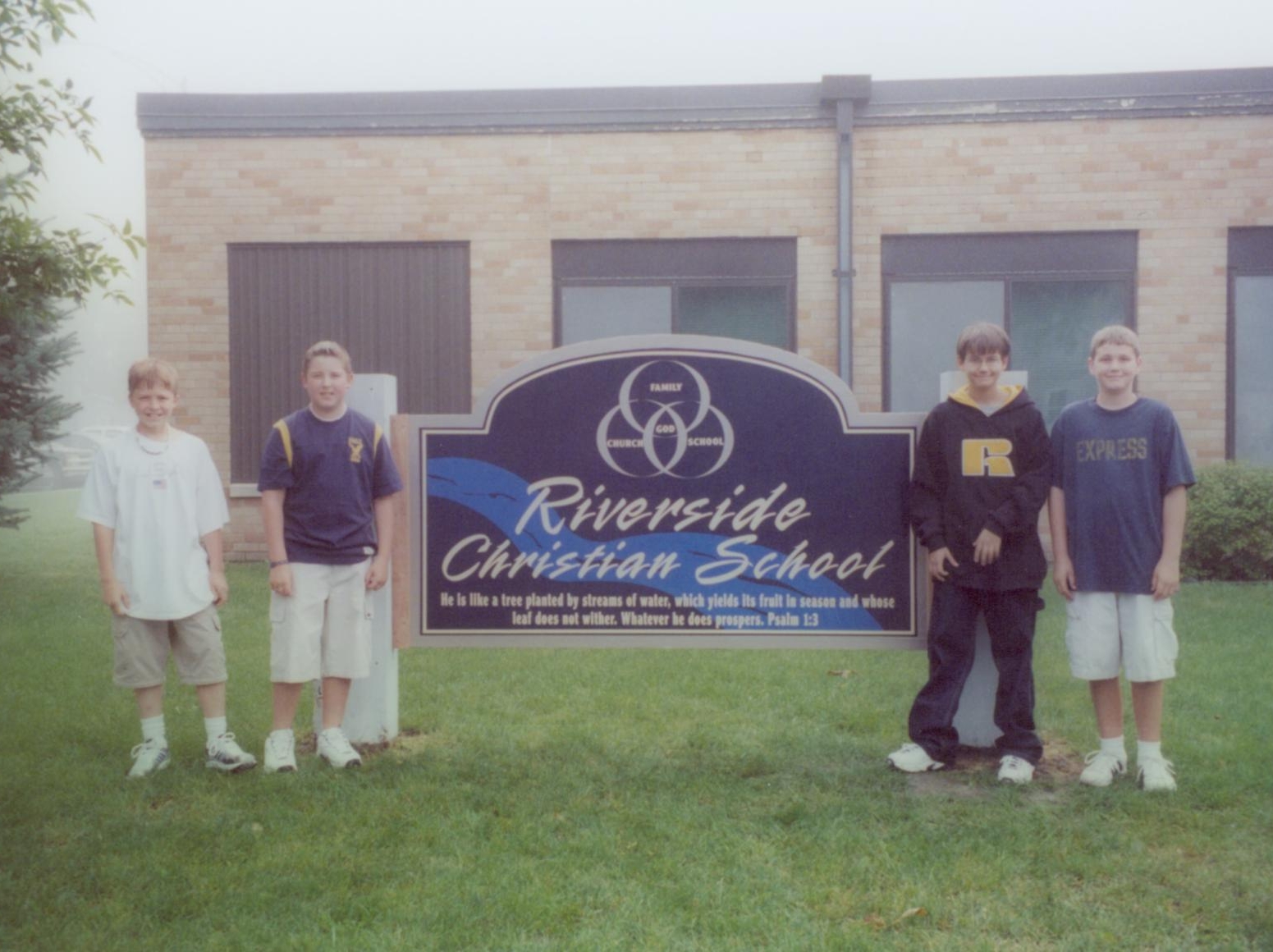 school sign with kids